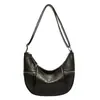 Bolso de media luna de moda, bolso cruzado para mujer, bolso tipo dumpling casual y versátil, bolso de nicho para mujer, nuevo bolso de hombro de cuero suave 2026