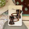 Nova Presilha de Cabelo Infantil Coreana Retrô com Estampa de Leopardo e Laço Presilha Lateral de Veludo Doce e Descolada para Meninas Acessórios de Cabelo Presilha BB para Mulheres