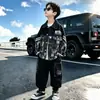 Traje de Primavera y Otoño para Niños 2026 Nuevo Estilo Niños Medianos y Grandes Estilo Urbano Chaqueta Fresca Pantalones de Trabajo con Bloques de Color Conjunto de Dos Piezas Fresco y Moderno Otoño