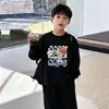 Ropa interior básica de algodón puro para niños Primavera Otoño 2026 Nuevo estilo Niños Elegante Versátil Top Talla Mediana y Grande Niños Cuello Redondo Manga Larga Camiseta