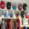 Amazon transfronterizo nuevo gancho para gorra de béisbol gancho para gorra gancho para gorra sin costuras almacenamiento simple Gancho para sombrero