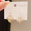 Pendientes de Flor Dorada Sencillos y Elegantes con Incrustaciones de Circonita, Elegantes y Versátiles, Pendientes de Lujo Ligero de Gama Alta al por Mayor