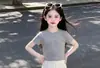 Falda blanca larga para niña, conjunto de falda hasta la rodilla, camiseta de manga corta para niña estilo coreano, nuevo de verano 2026