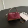 Bolso de mano único y discreto de lujo para mujer, nuevo modelo 2026, lindo y versátil, bolso de hombro y cruzado vintage de otoño para el trabajo