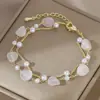 Transmisión en Vivo de Douyin Venta Caliente Joyería de Mano de Trébol de Cuatro Hojas Pulsera de Amor Camelia de Gama Alta para Mujer Pulsera Estilo Commuter Venta al por Mayor