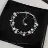 Elegante pulsera de perlas y diamantes estilo francés, moderna, exquisita, de nicho, de alta gama, de lujo ligero, creativa, extremadamente hermosa, joyería versátil