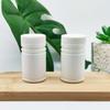 Venta al por mayor del fabricante 60 ml Botella de plástico de bambú para producto de cuidado de la salud Tapa de rosca a presión Botella para envasado de polvo de tabletas Sello