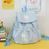 Mochila de Tela con Cordón y Solapa de Lunares Azul Leche Conejo Estilo Fresco de Verano Suave Pegajoso Chica Suave Estilo Campus Mochila Pequeña Nueva
