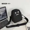 Bolso cruzado estilo Ins nicho de dibujos animados de fantasma para mujer estilo japonés estilo feo y lindo elegante casual versátil estudiante bolsa pequeña