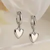 Aretes colgantes de flor estrella simple encantador de estilo europeo y americano nicho de alta gama versátil chapado en oro circonita