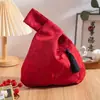Bolsa de muñeca con borla de jacquard de seda dorada, nuevo regalo chino, caja de regalo para boda y festival, nueva bolsa de regalo de mano
