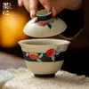 Gaiwan de Cerâmica Estilo Antigo Pintado à Mão com Esmalte Caramelo e Design de Pêssego Índigo para Uso Doméstico, Adequado para Chá Kung Fu e Preparo de Chá