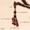 Al por mayor Mineral Crudo Natural Alto Contenido Cinabrio Oro Púrpura Torre Wen Chang Llavero de Bolígrafo Accesorios de Colgante para Bolsos Creativos Culturales Tendencia Nacional Más Vendidos