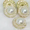 Atacado em estoque botão de metal de alta qualidade formato de flor fivela de pérola borda de pérola estilo Chanel botão renda fumaça 23MM moda