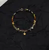 Nuevo Pulsera Tejida Colorida Simple Estilo Chino Moda Delicada Pulsera de Flor Grava Estrella Joyería Artesanal de Pez Pequeño