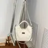 Bolso de hombro versátil de moda transfronterizo con un toque de alta gama, adecuado para ir al trabajo, bolso tipo cubo vintage, bolso de mano acolchado simple casual