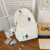Mochila refrescante azul leche bordada a punto de cruz, un estilo dulce y fresco para niñas, perfecta para el uso diario, la escuela y las vacaciones
