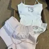 Conjunto de dos piezas para casa, top tipo camisola blanco con estampado de Hello Kitty de dibujos animados, con copas en el busto y shorts rosas ajustados