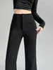 Foto real de los nuevos pantalones de traje de seda helada de otoño 2026, pantalones de pierna ancha acampanados de cintura alta, finos, de largo hasta el suelo para mujer