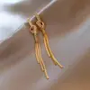 Pendientes de Borla de Perla de Circonita de Aguja Plateada Pendientes Largos de Mariposa de Lujo Accesible Francés Pendientes de Diseño Versátil para Mujer