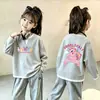 Top de punto gofre estilo coreano, imitación de dos piezas, manga larga para niñas, nuevo estilo primavera/otoño para niños medianos y grandes, versátil, elegante, capa base holgada
