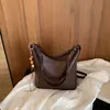 Bolso de Gran Capacidad con Sensación Relajada 2026 Otoño Temprano Nuevo Bolso de Hombro Individual para Debajo del Brazo Moda de Nicho Color Sólido Bolso Tote Cruzado