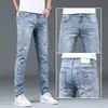 Calça Jeans Masculina 2024 Primavera e Outono Stretch Slim-Fit Perna Afunilada Casual Reta Marca Lavada Versátil Calça Longa para Homens