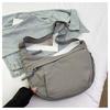 Bolsa de pano de nylon feminina 2024 primavera e verão novo design de moda bolsa de bolinho de massa alça de ombro larga bolsa transversal de ombro para todos os jogos