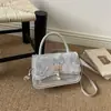 Bolso cuadrado pequeño de lujo ligero estilo coreano transfronterizo para mujer, nuevo bolso de hombro de mariposa invierno 2025, bolso cruzado de alta gama