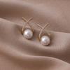 Aretes de perlas estilo lujo ligero para mujer al por mayor temperamento de Corea del Sur aretes netos rojos nuevos aretes de moda alto sentido