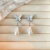 Pendientes largos de mariposa estilo francés con perlas y gotas de agua para mujer, ligeros, lujosos, de alta gama, combinables con todo, elegantes y a la moda.