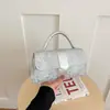 Bolso de mano para mujer para comercio exterior, nuevo bolso cuadrado pequeño de moda 2026, bolso cruzado artístico de nicho estilo ins, bolso de mano para mujer