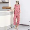 Nuevo traje de algodón y seda para mujer, atuendo elegante de verano para mamá, moderno y rejuvenecedor, conjunto casual de dos piezas sin mangas de alta gama