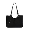 Bolso tote retro de gamuza casual de alta gama para mujer, nuevo 2026, bolso de hombro simple y moderno de gran capacidad
