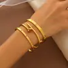 Conjunto de Pulseras de Acero Inoxidable Doradas Transfronterizas con Clavos de Diamante Pulsera de Trébol de Cuatro Hojas Cintura Pequeña Brazaletes Dorados