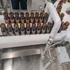Línea de llenado y etiquetado de alta velocidad para solución oral de 100 ml, máquina de llenado y tapado para líquido oral de 10 ml, 50 ml