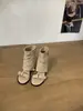 Primeiro Encontro Ji Estilo Retrô Bico Redondo Fivela de Couro Botas de Moda de Cano Médio Femininas 2026 Novo Estilo Primavera/Verão Aumento Interno de Altura Slip-on Exposto