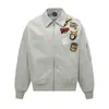 Chaqueta Unisex de Tendencia Nacional Retro Americana 2025 con Bordado de Flocado de Dibujos Animados, Estilo High Street Versátil, Abrigo de Cuello Alto Estilo Universitario