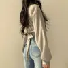 Blusa Corta con Encaje en la Espalda y Mariposa Rocío en el Ombligo para Primavera y Otoño en Corea del Sur
