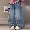Calça Jeans Infantil Estilo Primavera e Outono 2026 Nova Roupa Infantil Calças Estilo Travesso e Descolado Calças Casuais para Crianças Maiores Calças Scimitarra para Meninos