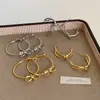 Pendientes de Aro de Metal Retorcido con Lazo de Diseño Único para Mujer, Pendientes de Tendencia de Moda Simples y Elegantes