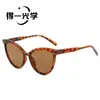Gafas de sol europeas y americanas de montura grande estilo ojo de gato transfronterizas, gafas de sol personalizadas de moda para mujer con bloques de color y protección solar