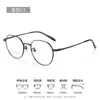 Gafas nude redondas de montura pequeña para mujer con cara pequeña, montura de titanio para alta miopía T81005, montura de gafas ultraligera estilo coreano