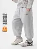 Calça casual de inverno forrada com fleece para meninos da Europa Ocidental, para crianças maiores, novo estilo 2026 de roupas infantis, calça de moletom de inverno para crianças e bebês