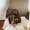 Bolso moderno y único con estampado de leopardo para mujer, nueva colección 2026, bolso cruzado versátil para el día a día, bolso tote pequeño de moda, bolso con forma de albóndiga
