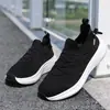 Zapatos Deportivos Nuevos Primavera y Otoño 2025 Tejido Fly-Knit Elástico de Moda Zapatos Casuales para Hombre Suela Ultra Suave Zapatos para Correr Negros
