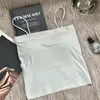 Camisola de seda de hielo con copas fijas, adecuada para usar por dentro o por fuera, sin costuras, con efecto push-up y almohadillas en el pecho, camiseta base fina para mujer con hermoso diseño en la espalda