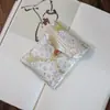 Muestra de pedido final se puede pedir bolsa de tela de brocado para regalo bolsa Wenwan estilo japonés bolsa de almacenamiento de joyas billetera plegable tela