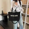 Comércio exterior por atacado moda europeia e americana letra 2026 nova bolsa de ombro retrô grande capacidade bolsa tote para trabalho e deslocamento