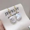 Zhuji Suministro en Vivo Ganchos para Pendientes de Perlas de Agua Dulce Naturales Moda Simple Pendientes de Perlas Barrocas de Gama Alta Pendientes